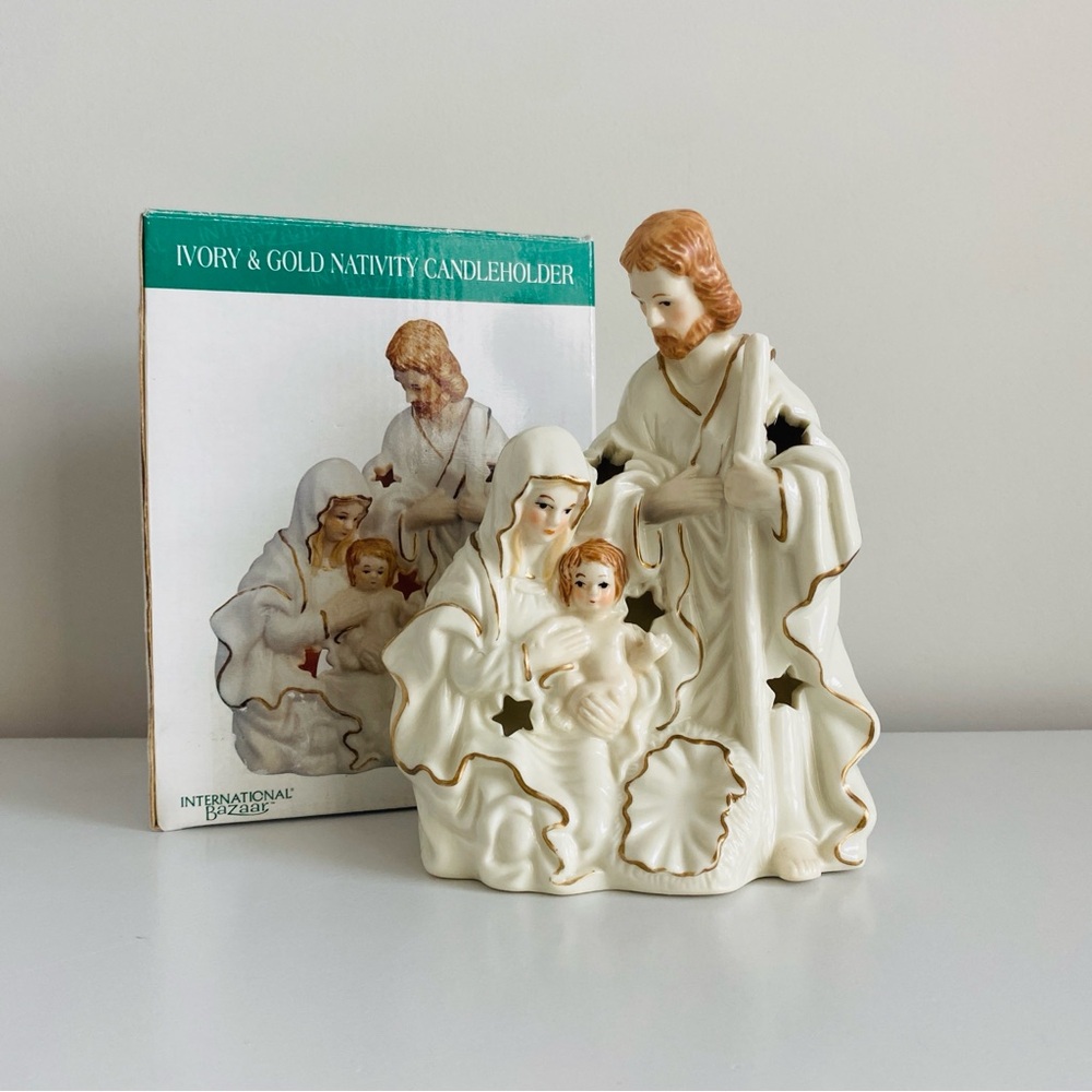 International bazaar ivory & gold nativity candle holder